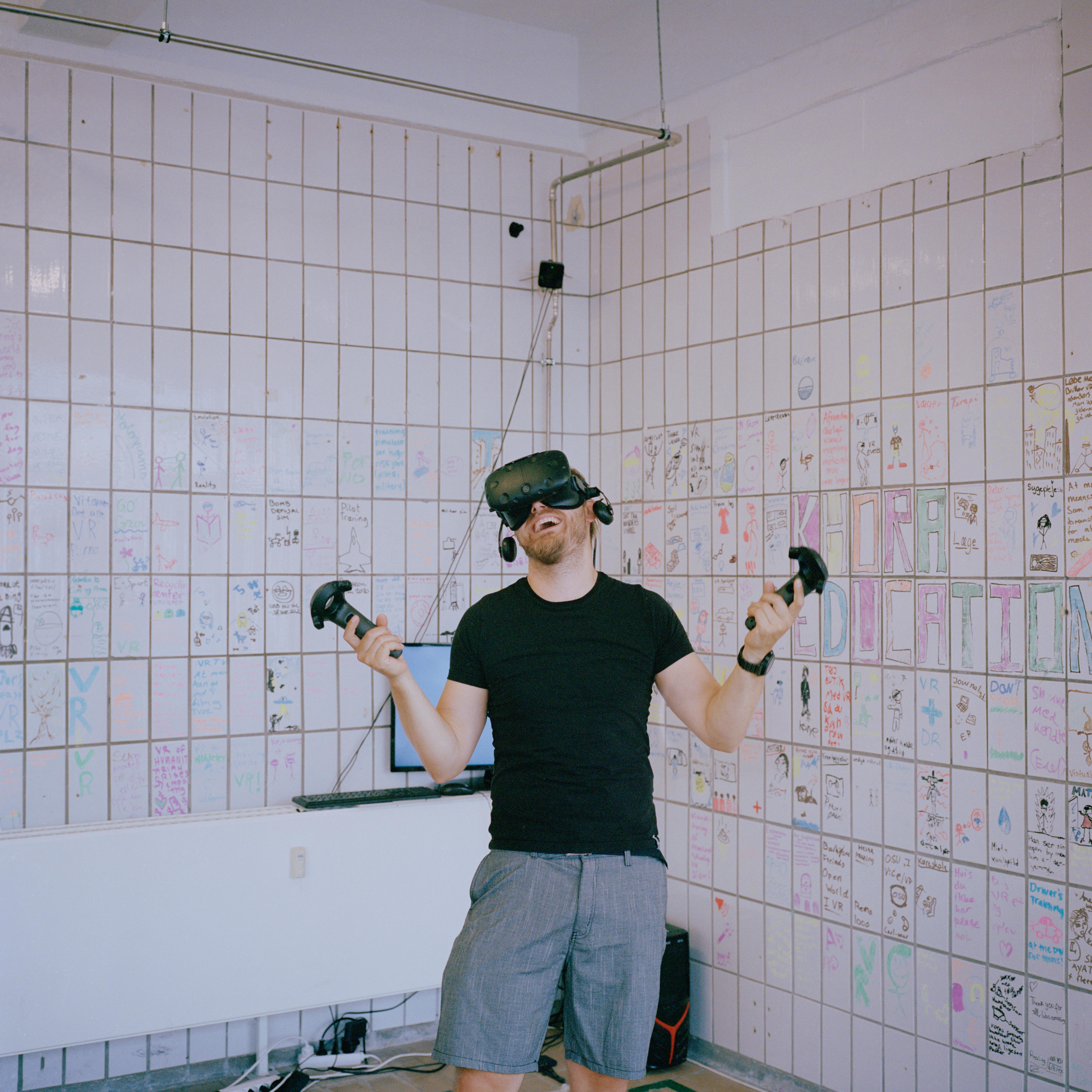 A man uses a virtual reality headset.