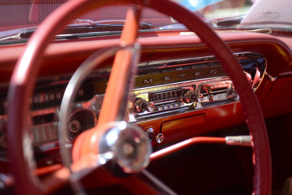 Detail shot of a the dash of an older c classic car.