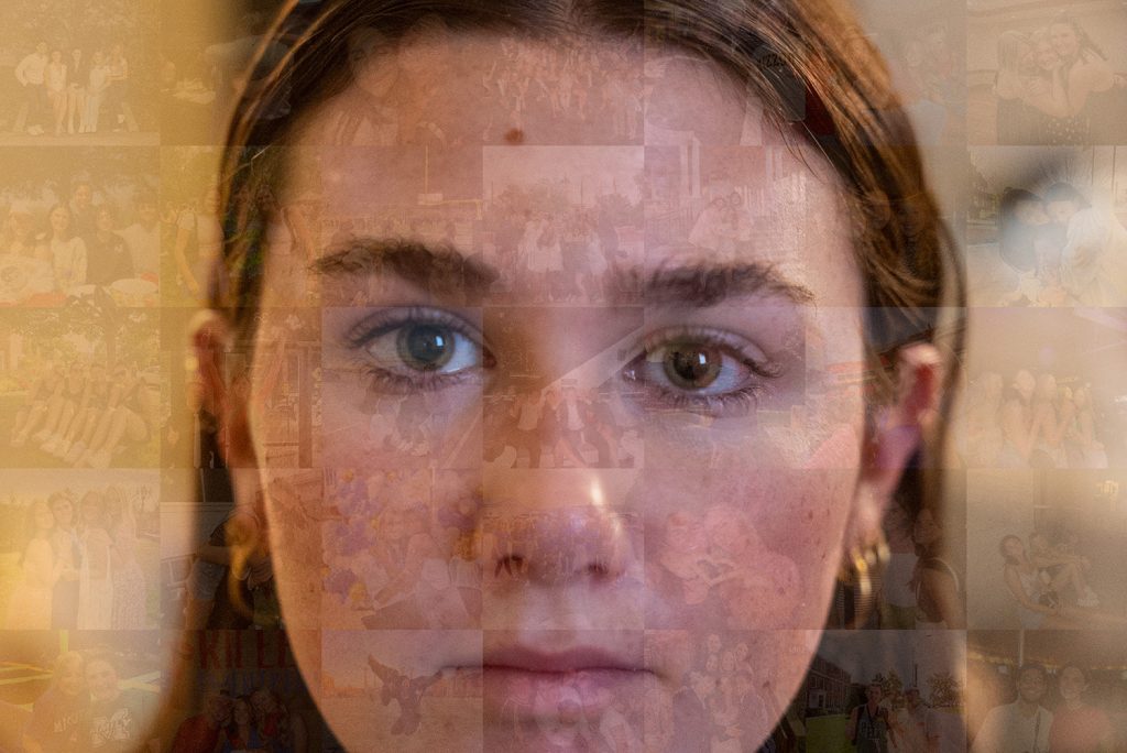 Photograph of a young woman looking at the camera.